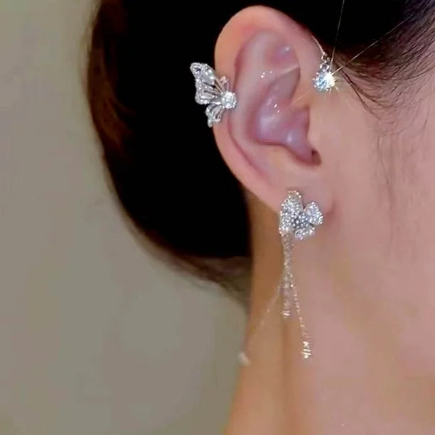 Aretes Mariposa pompón sin perforación en (DORADO Y PLATEADO)